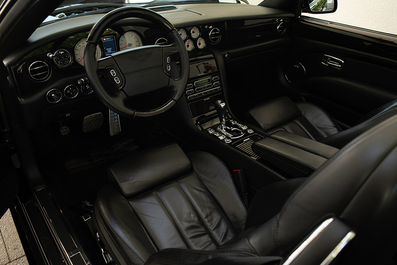 Simon Cowell's Bentley and Bronco at Barrett-Jackson